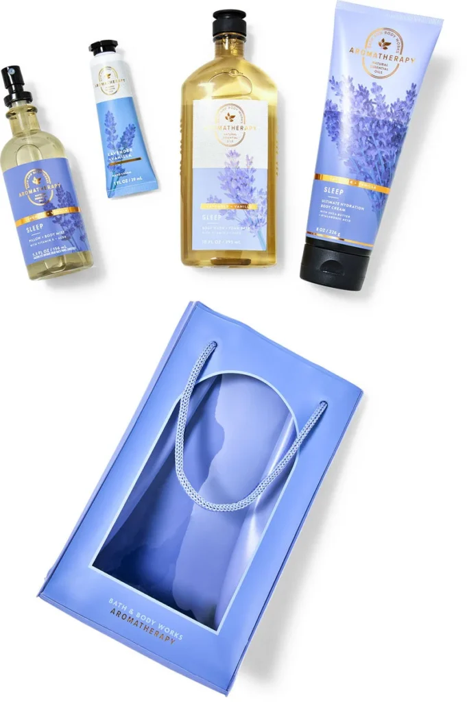 Bath and Body Works Aromatherapy Sleep collection in lavender vanilla scent, featuring pillow mist, body lotion, shower gel, body cream, and a gift bag.