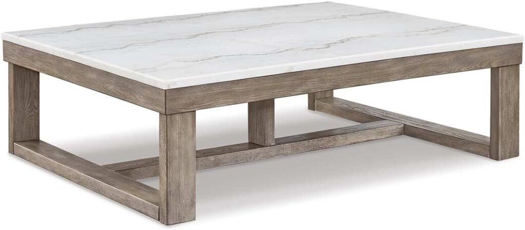 Low-profile rectangular coffee table with a white marble top and a wooden frame in a rustic finish.