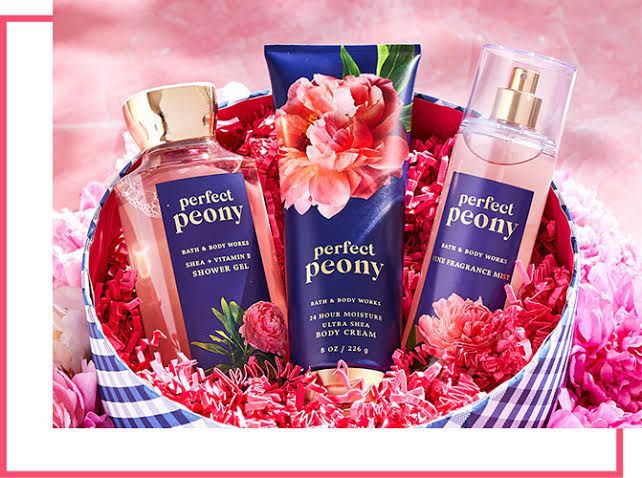 Bath and Body Works Perfect Peony shower gel, body cream, and fragrance mist set in a floral gift basket.