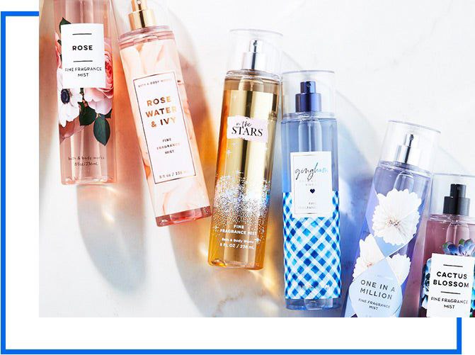 Assortment of fine fragrance mists including Rose, Rose Water & Ivy, In the Stars, Gingham, One in a Million, and Cactus Blossom, arranged on a light background.