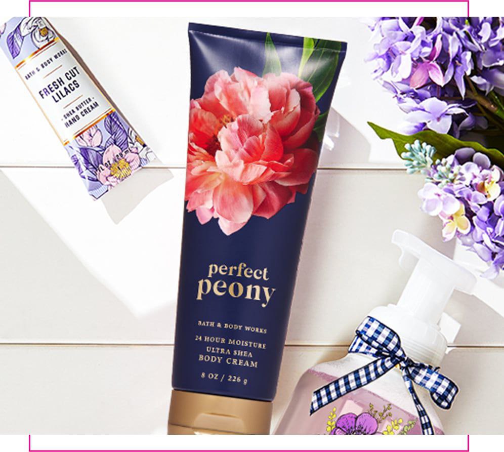 Perfect Peony body cream, Fresh Cut Lilacs hand cream, and floral foaming hand soap displayed with purple lilac flowers.