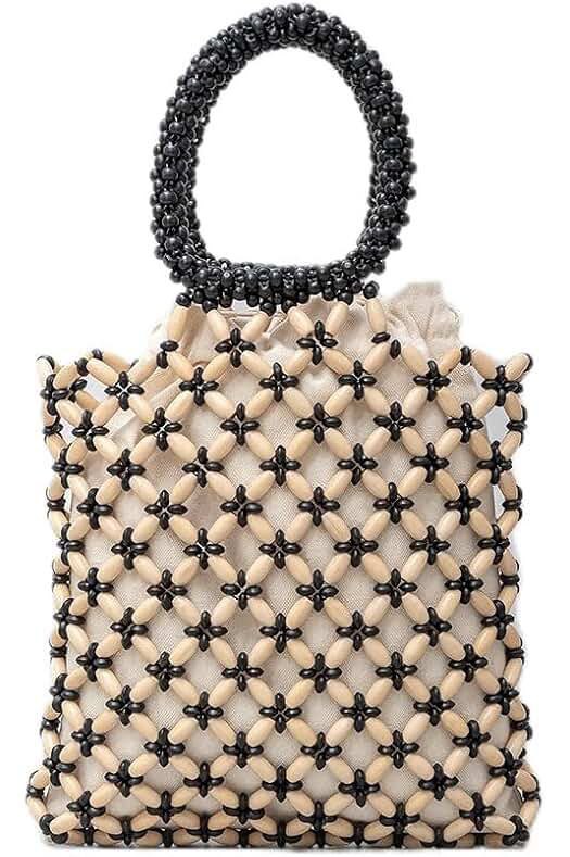 Beaded bag with a lattice pattern in black and beige, featuring round black handle and intricate beadwork for a chic, vintage-inspired look.