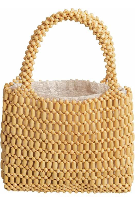 Natural beaded bag with a sturdy handle, crafted from light wooden beads for an eco-friendly and minimalist style.