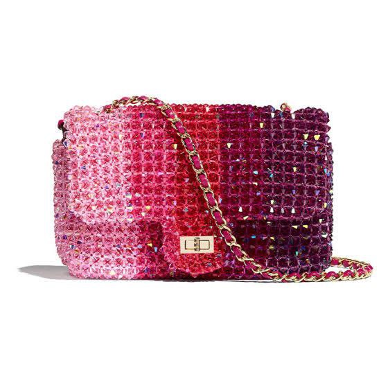 Vibrant beaded bag with an ombre design transitioning from pink to purple, featuring a gold chain strap and a metallic clasp for a trendy, eye-catching accessory.